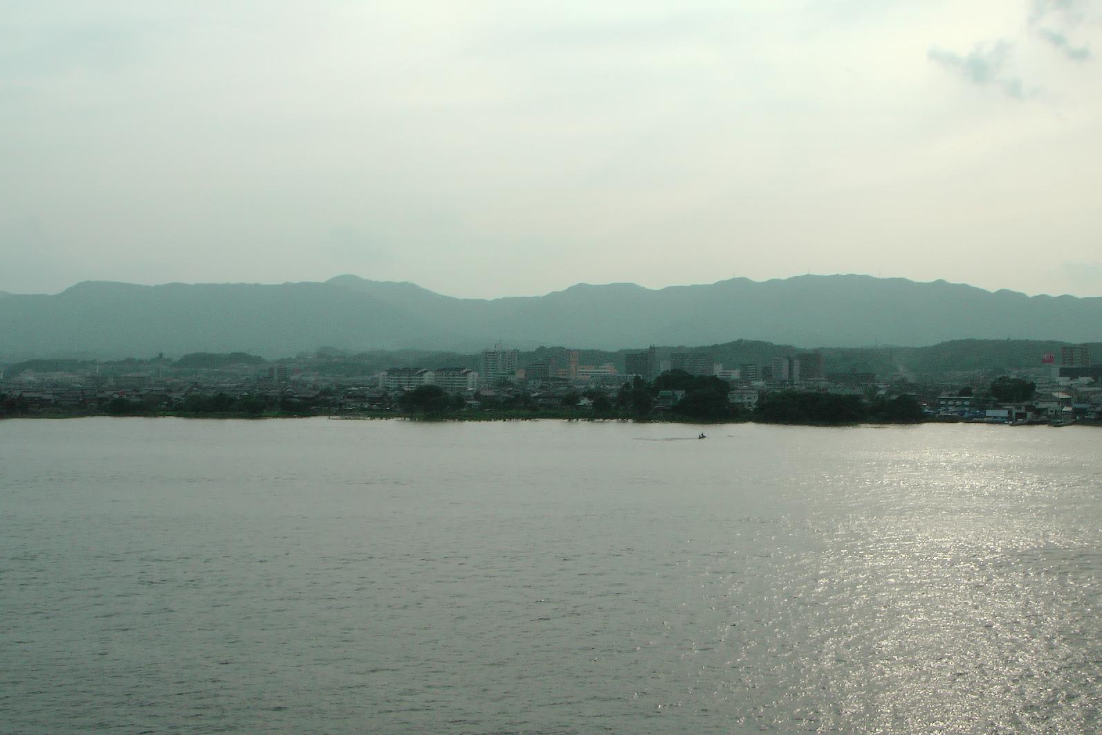 now from the east side of the lake. Behind those mountains lies Kyoto.