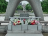 The cenotaph located between the peace museum and the A-bomb dome.