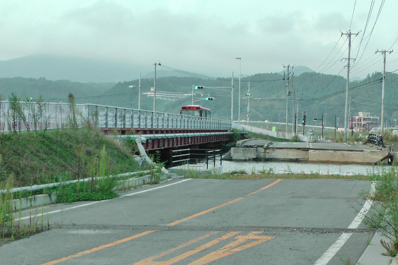 old road on the right new bridge on the left. Build a bit higher as the country sank through the earthquake.