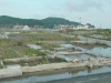 This residential area is flooded because the country sank through the earthquake.