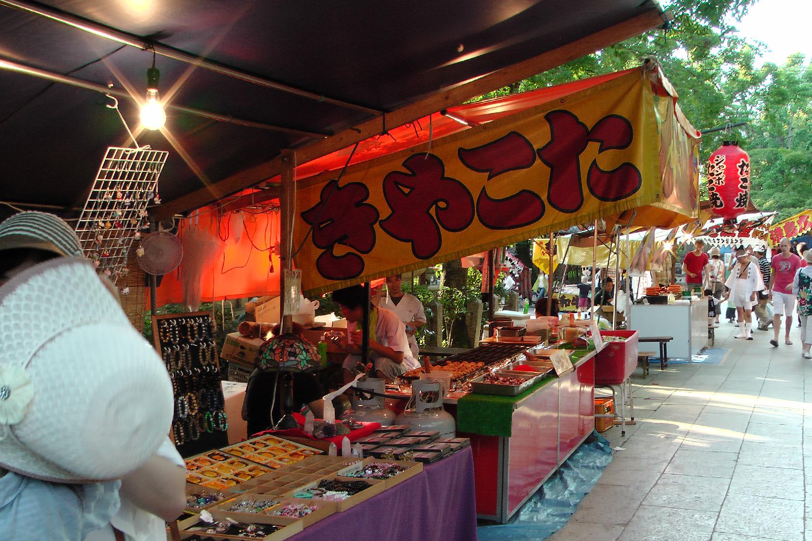 Takoyaki booth. (written the traditional way from right to left)